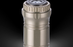 A magic device in hand, a pilot's portable electric razor.